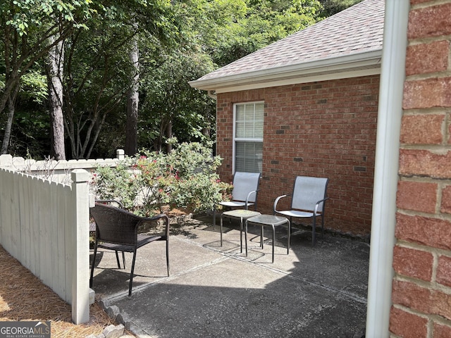 view of patio / terrace with fence