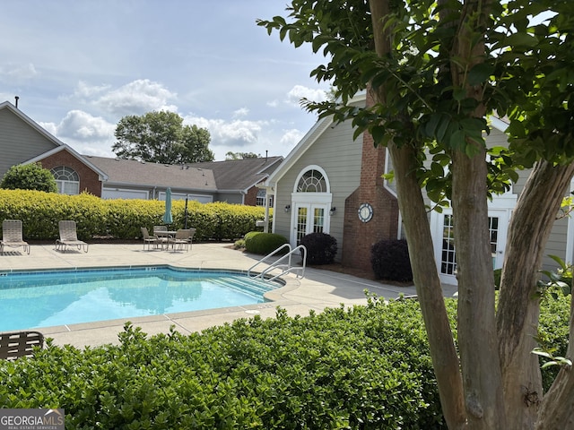 3024 Orchard Ridge Cir, Duluth, GA 30096 - community pool with french doors and a patio
