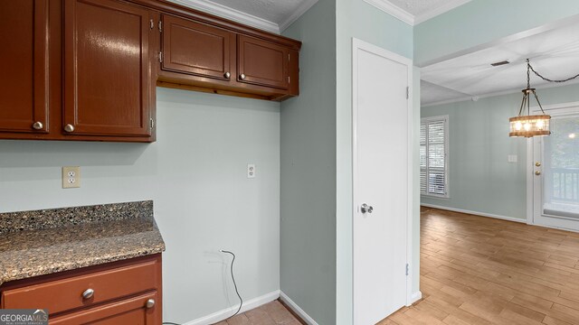 4771 Pinefield Dr NW, Acworth, GA 30102 - bathroom with tiled bath, vanity, toilet, and crown molding