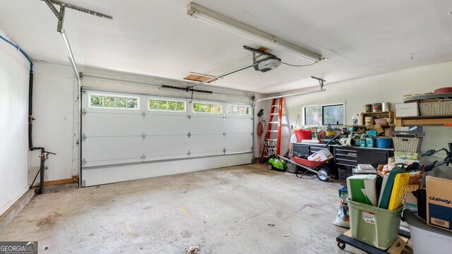 4771 Pinefield Dr NW, Acworth, GA 30102 - view of front of home featuring a porch, an attached garage, driveway, a front yard, and roof with shingles