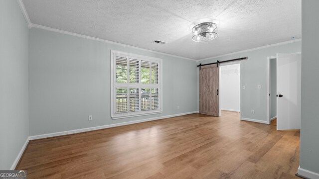 4771 Pinefield Dr NW, Acworth, GA 30102 - dining room with light wood-style flooring, baseboards, and crown molding