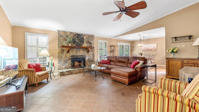 4771 Pinefield Dr NW, Acworth, GA 30102 - living area with ornamental molding, a ceiling fan, light tile patterned floors, a fireplace, and vaulted ceiling