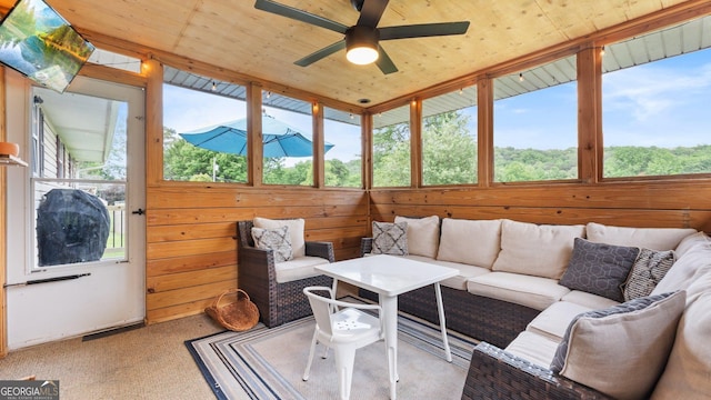 254 Merilyn Dr, Ringgold, GA 30736 - sunroom featuring an outdoor hangout area, ceiling fan, healthy amount of natural light, and wood walls