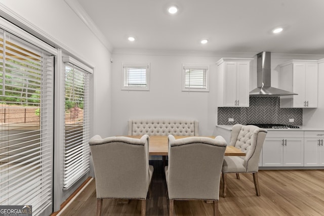 207 Hickory Bluffs Pkwy, Canton, GA 30114 - dining room with crown molding, light wood-style floors, and recessed lighting