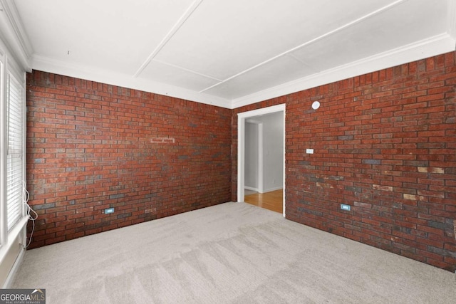 2620 Dr Bramblett Rd, Cumming, GA 30028 - carpeted spare room featuring brick wall and ornamental molding