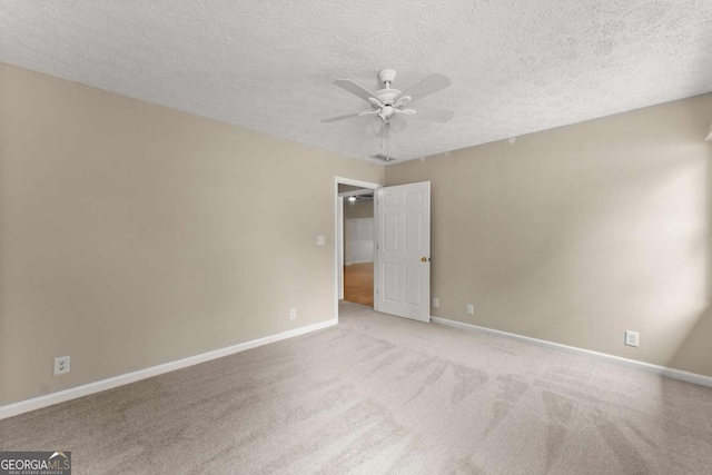 2620 Dr Bramblett Rd, Cumming, GA 30028 - spare room with a ceiling fan, carpet, baseboards, and a textured ceiling