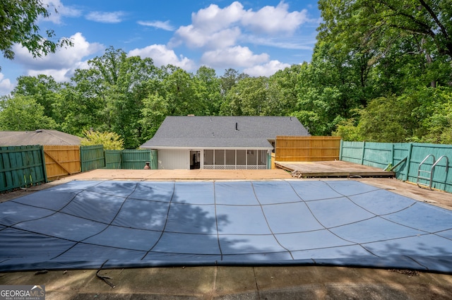121 Stonewood Dr, Toccoa, GA 30577 - view of pool with a deck, a fenced backyard, and a sunroom
