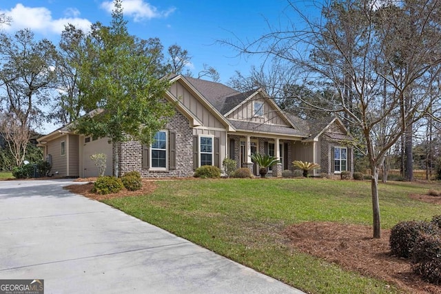 4227 Tillman Blf, Valdosta, GA 31602 - craftsman house featuring board and batten siding, driveway, a front yard, and an attached garage