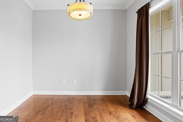 4227 Tillman Blf, Valdosta, GA 31602 - empty room with wood finished floors, ornamental molding, and baseboards