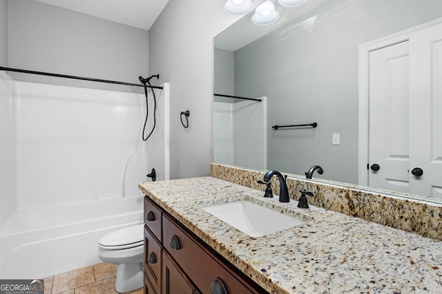 4227 Tillman Blf, Valdosta, GA 31602 - bathroom featuring toilet, bathing tub / shower combination, vanity, and tile patterned floors