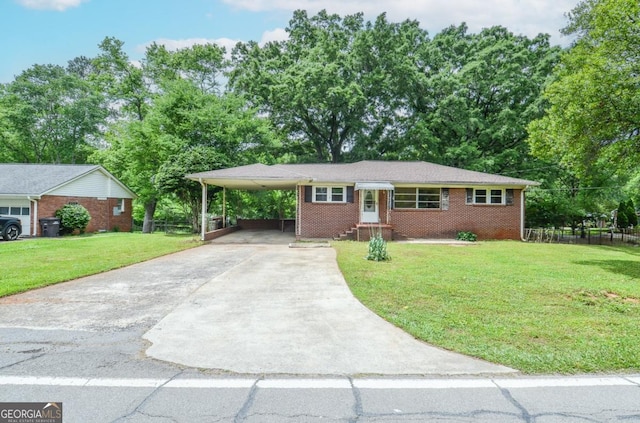 706 Jones Mill Rd, Cartersville, GA 30120 - ranch-style home with driveway, a carport, and brick siding