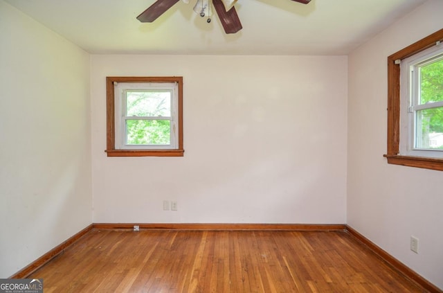 706 Jones Mill Rd, Cartersville, GA 30120 - unfurnished room with ceiling fan, baseboards, and wood-type flooring