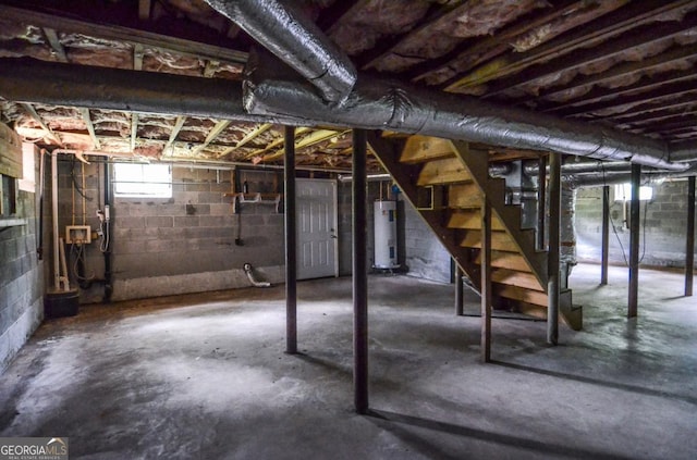 706 Jones Mill Rd, Cartersville, GA 30120 - basement with water heater and stairway