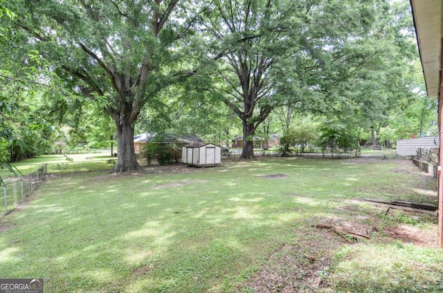 706 Jones Mill Rd, Cartersville, GA 30120 - view of yard with a storage shed and an outbuilding
