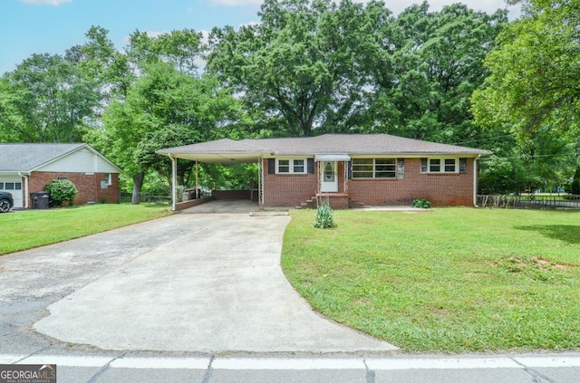 706 Jones Mill Rd, Cartersville, GA 30120 - single story home with concrete driveway, an attached carport, and brick siding
