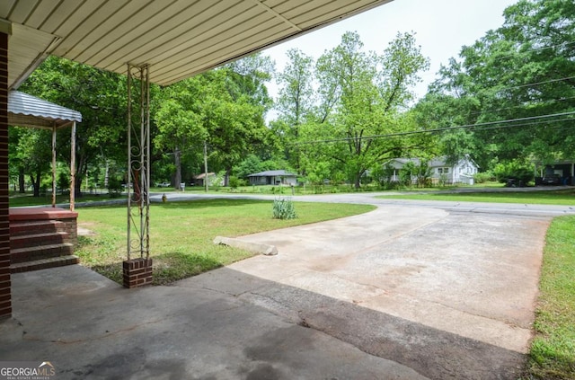 706 Jones Mill Rd, Cartersville, GA 30120 - view of grassy yard featuring view of wooded area