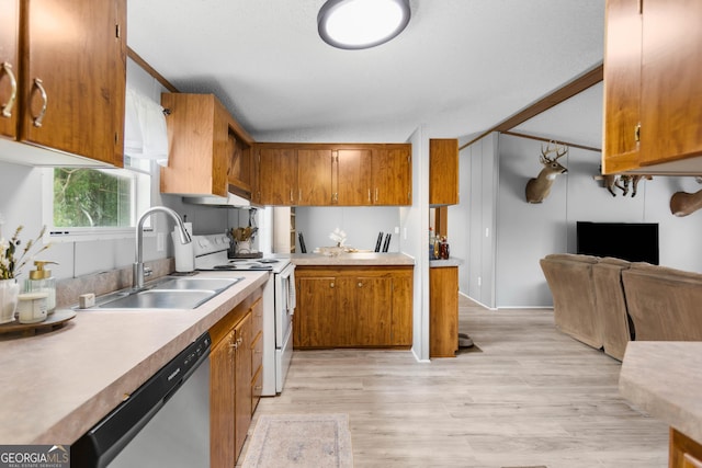 2021 Wyche Cir, Elberton, GA 30635 - kitchen with white electric stove, a sink, dishwasher, and brown cabinetry