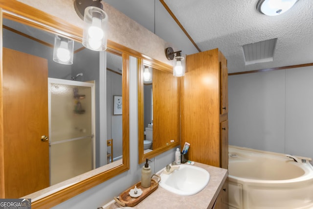 2021 Wyche Cir, Elberton, GA 30635 - full bath with a stall shower, a textured ceiling, vanity, a bath, and toilet