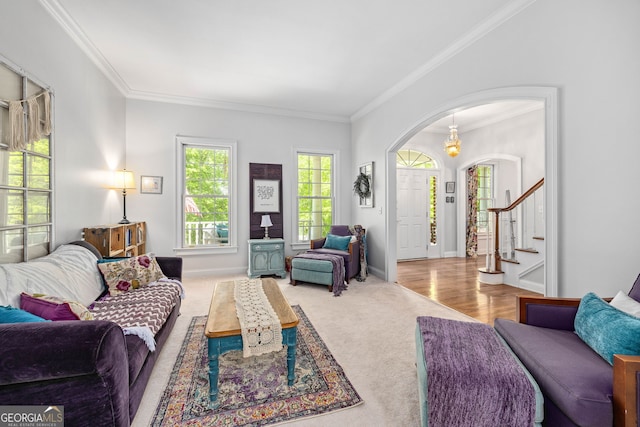 490 Water Wheel Ct, Cornelia, GA 30531 - living room with arched walkways, ornamental molding, stairs, carpet floors, and baseboards