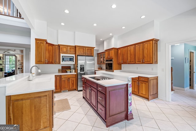 490 Water Wheel Ct, Cornelia, GA 30531 - kitchen with a sink, stainless steel appliances, light tile patterned floors, recessed lighting, and light countertops