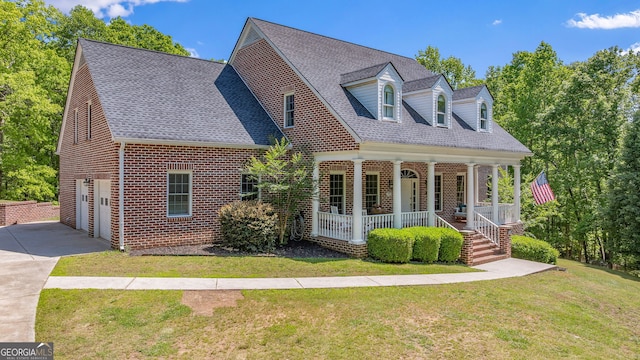 490 Water Wheel Ct, Cornelia, GA 30531 - cape cod-style house featuring a porch, brick siding, a front lawn, and a shingled roof