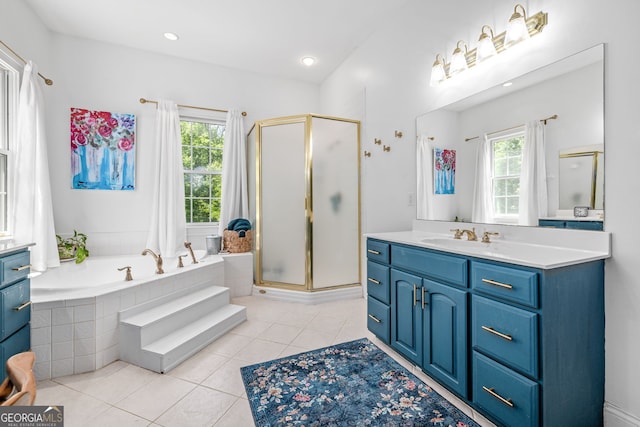 490 Water Wheel Ct, Cornelia, GA 30531 - full bathroom featuring vanity, a shower stall, a garden tub, and tile patterned floors