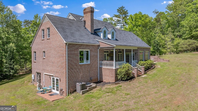 490 Water Wheel Ct, Cornelia, GA 30531 - rear view of property with a lawn, a chimney, french doors, brick siding, and central AC unit