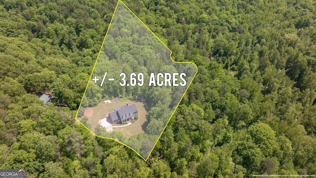 490 Water Wheel Ct, Cornelia, GA 30531 - aerial view of property and surrounding area with a forest and property parcel outlined
