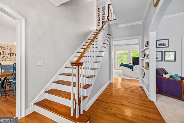 490 Water Wheel Ct, Cornelia, GA 30531 - stairway with crown molding, wood finished floors, and baseboards