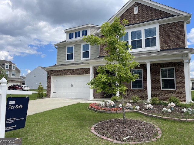 3172 Lowell Rd, Bethlehem, GA 30620 - view of front facade with brick siding, an attached garage, concrete driveway, and a front yard