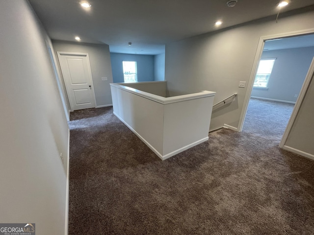 3172 Lowell Rd, Bethlehem, GA 30620 - hallway with an upstairs landing, dark carpet, healthy amount of natural light, and recessed lighting