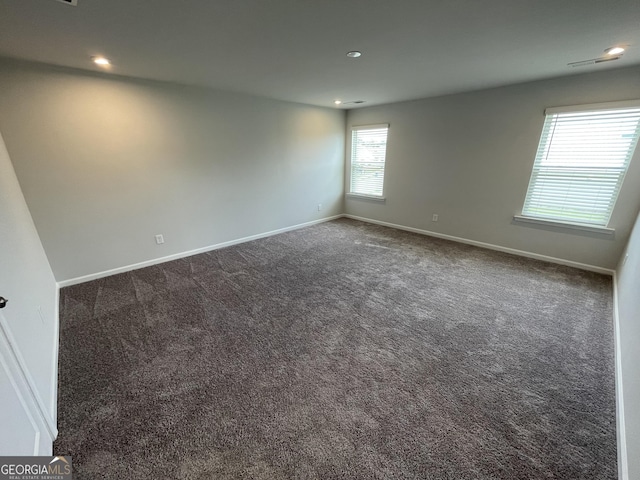 3172 Lowell Rd, Bethlehem, GA 30620 - empty room with baseboards, dark colored carpet, and recessed lighting