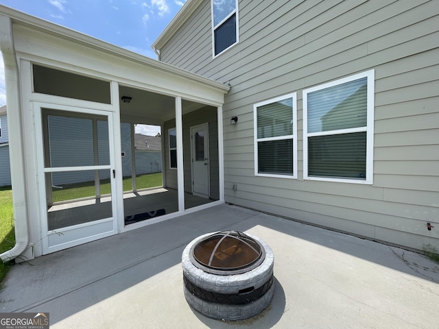 3172 Lowell Rd, Bethlehem, GA 30620 - view of patio with a fire pit and a sunroom