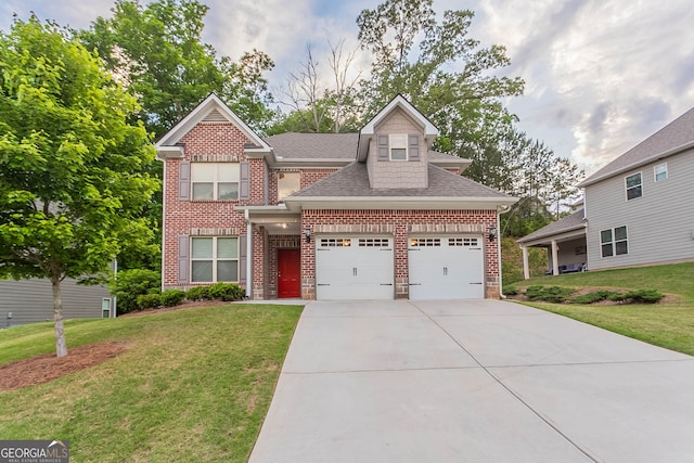 view of front of home with a front yard, an attached garage, driveway, and brick siding