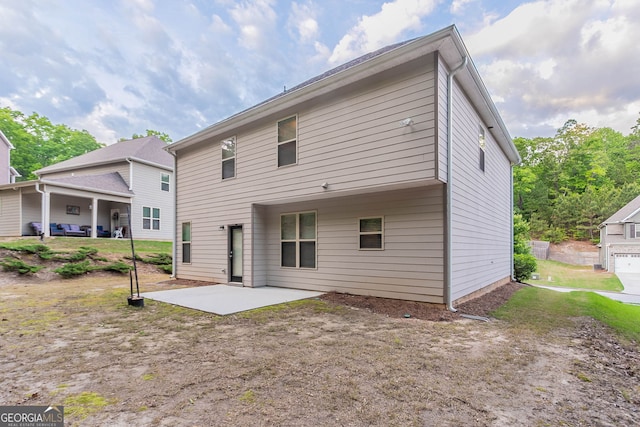 back of property with a patio area