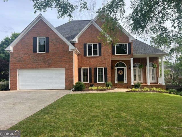 315 Hembree Grove Trce, Roswell, GA 30076 - view of front of home with concrete driveway, an attached garage, brick siding, and a front yard
