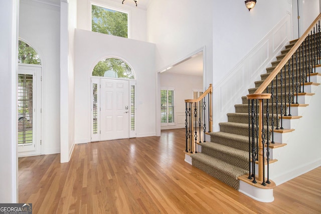315 Hembree Grove Trce, Roswell, GA 30076 - foyer with a high ceiling, stairway, wood finished floors, and baseboards