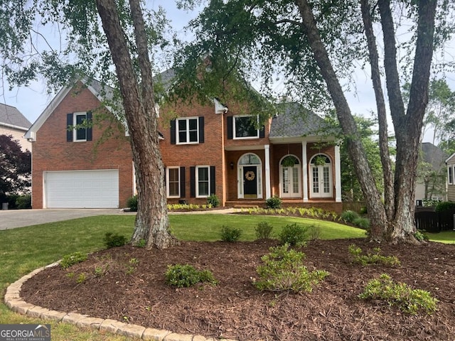 315 Hembree Grove Trce, Roswell, GA 30076 - view of front of property with an attached garage, concrete driveway, brick siding, and a front lawn