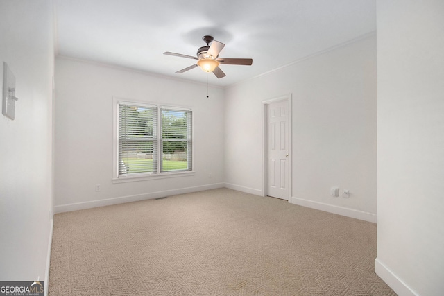 315 Hembree Grove Trce, Roswell, GA 30076 - spare room featuring ceiling fan, carpet, ornamental molding, and baseboards