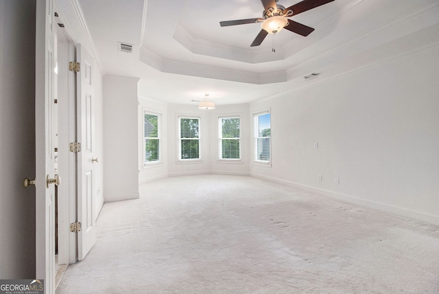 315 Hembree Grove Trce, Roswell, GA 30076 - empty room featuring light carpet, ceiling fan, crown molding, a raised ceiling, and baseboards