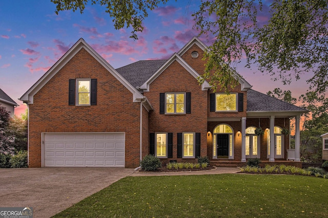 315 Hembree Grove Trce, Roswell, GA 30076 - view of front of house featuring a garage, concrete driveway, a front yard, and brick siding