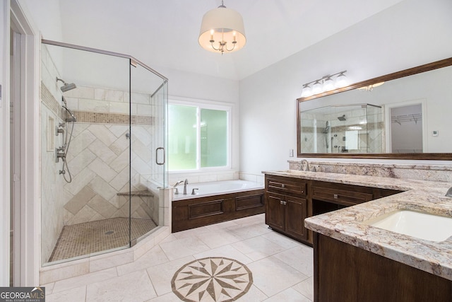 315 Hembree Grove Trce, Roswell, GA 30076 - full bathroom with vanity, a garden tub, a shower stall, and tile patterned floors