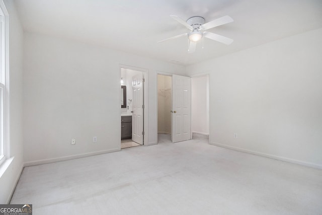 315 Hembree Grove Trce, Roswell, GA 30076 - unfurnished bedroom with a spacious closet, baseboards, and carpet flooring