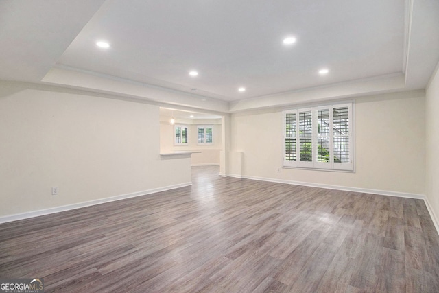 315 Hembree Grove Trce, Roswell, GA 30076 - unfurnished living room featuring a raised ceiling, wood finished floors, recessed lighting, and baseboards