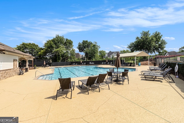 315 Hembree Grove Trce, Roswell, GA 30076 - community pool featuring a patio