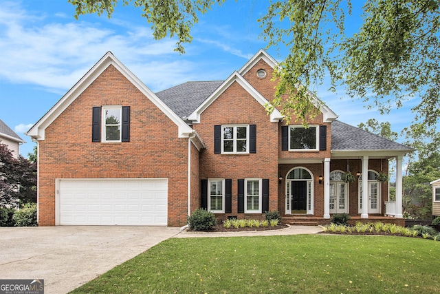 315 Hembree Grove Trce, Roswell, GA 30076 - view of front of property featuring a garage, driveway, a front yard, and brick siding