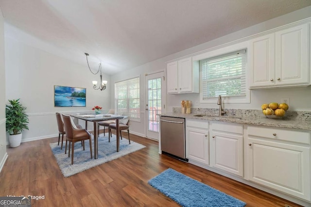 343 Ashton Way, Winder, GA 30680 - kitchen with dishwasher, a sink, a chandelier, white cabinets, and wood finished floors