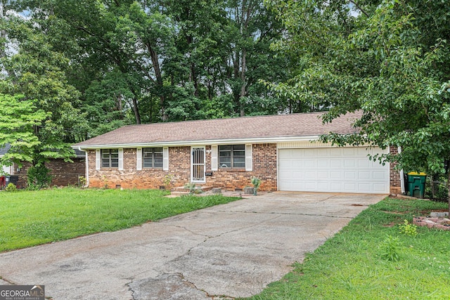 2954 Ann Marie Ln, Rex, GA 30273 - view of front of house featuring driveway, brick siding, a garage, a front lawn, and roof with shingles