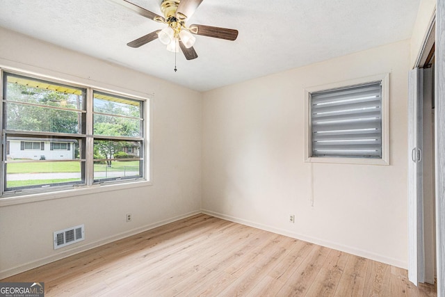 2954 Ann Marie Ln, Rex, GA 30273 - spare room featuring light wood-style flooring and a ceiling fan