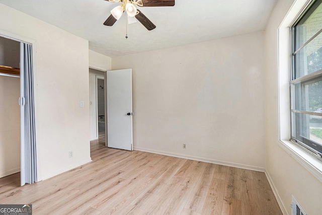 2954 Ann Marie Ln, Rex, GA 30273 - unfurnished bedroom featuring light wood-style floors and a ceiling fan